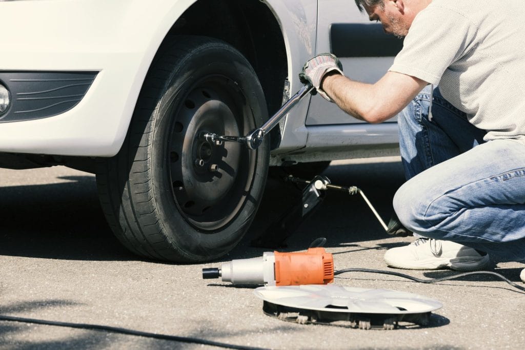 Man Changing Car Tyre